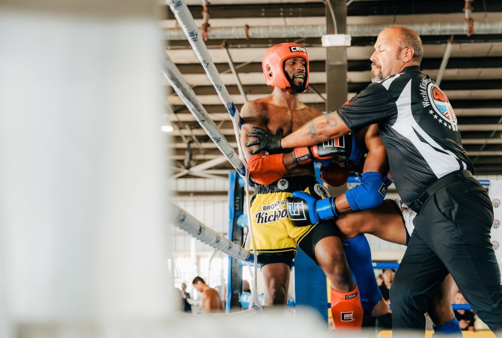 Coach Jerry in the ring at the 2025 WKA Muay Thai tournament.